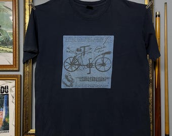 ヴィンテージTシャツ　ダーメージ　Lサイズ ヴィンテージ レオナルド・ダ・ヴィンチ 自転車 Tシャツ グラフィック