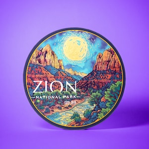 May include: A round sticker with a colorful illustration of Zion National Park, Utah. The sticker features a mountain range, a river, and a full moon in a blue sky. The text "Zion National Park" and "Est. 1819" is printed in white on the sticker.