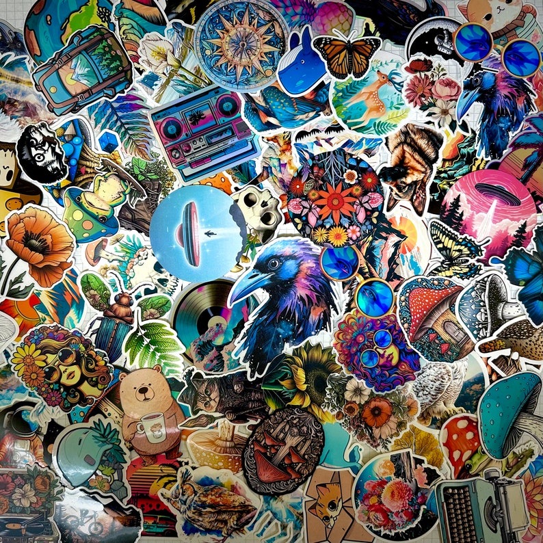 May include: A colorful collage of stickers featuring various designs, including a butterfly, a bird, a mushroom, a cassette player, a flower, and a crow. The stickers are arranged in a random pattern and are all different sizes and shapes.