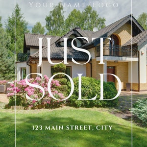 May include: A white sign with black text that reads "JUST SOLD" in large letters. Below the text is the address "123 MAIN STREET, CITY" and the phone number "123-556-7890". The sign is in front of a house with a green lawn and pink flowers.