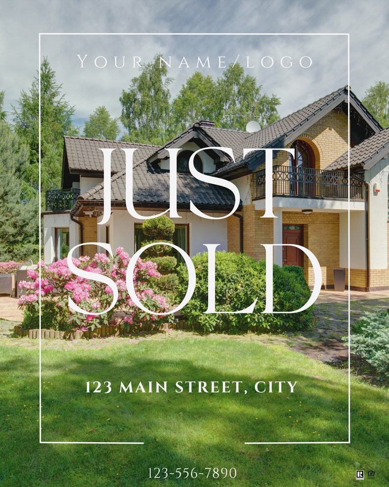 May include: A white sign with black text that reads "JUST SOLD" in large letters. Below the text is the address "123 MAIN STREET, CITY" and the phone number "123-556-7890". The sign is in front of a house with a green lawn and pink flowers.