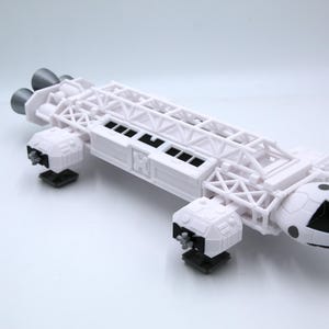 May include: A weathered wooden sign displaying the words "Welcome to our home" in white. The sign has a distressed appearance, suggesting a vintage aesthetic, and is suitable for a porch or hallway.