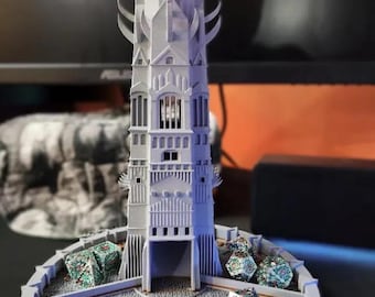May include: A 3D printed tower with a gray and white color scheme. The tower has a pointed roof and a large, open doorway. The tower is surrounded by a circular base with four sections. Each section contains a colorful, multi-sided die.