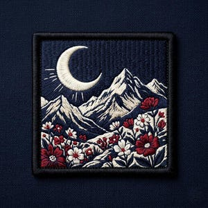 May include: Embroidered patch featuring a mountain landscape under a crescent moon. The design includes white mountains, red and white flowers, and a navy blue background. The patch has a black border.