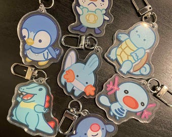 Pokemon Water Type acrylic keychains. Squirtle, mudkip, popplio, wooper, piplup, oshawott, Totodile.