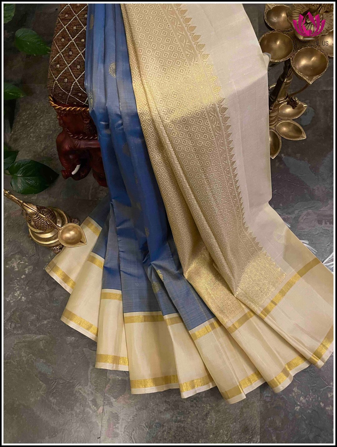 Elegant Kanchipuram Silk Saree with Floral Motifs and Dual Border