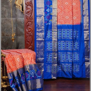 Ikkat Kanchipuram soft silk saree in Orange with Blue border