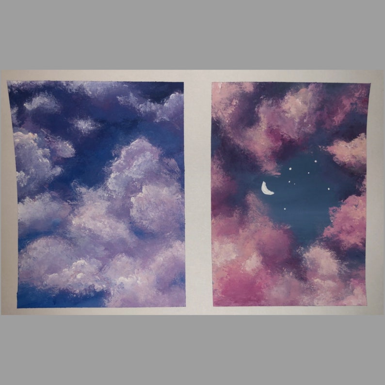 May include: Two paintings of a night sky with clouds. The painting on the left has a blue sky with white clouds. The painting on the right has a pink sky with white clouds and a crescent moon.