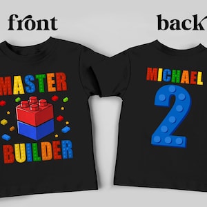 May include: Black t-shirt with a colorful "MASTER BUILDER" design featuring a block construction on the front. The back of the shirt displays the name "MICHAEL" and the number "2" in a block-style design.