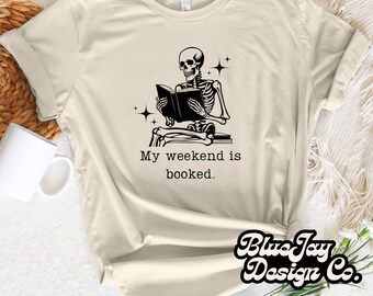 My Weekend is Booked. png, skeleton reading png, bookish png