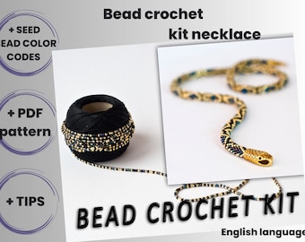 May include: Bead crochet kit for making a snake necklace. The kit includes black thread, seed beads in gold, black, and blue, and a PDF pattern. The kit is in English.