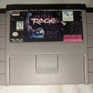 Juego en cartucho Primal Rage para consola Super Nintendo
