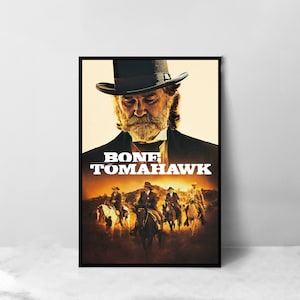 May include: A movie poster for the film "Bone Tomahawk" featuring a man in a black top hat and a long beard. The man is looking down at the camera. The poster also features a group of men on horseback riding through a desert landscape.