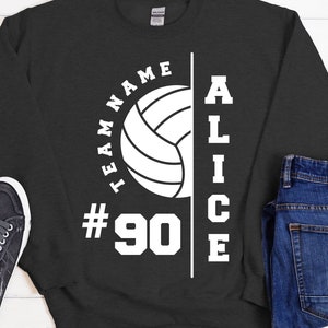 May include: A dark grey sweatshirt with white text that reads "Team Name #90 Alice" and a white volleyball graphic.