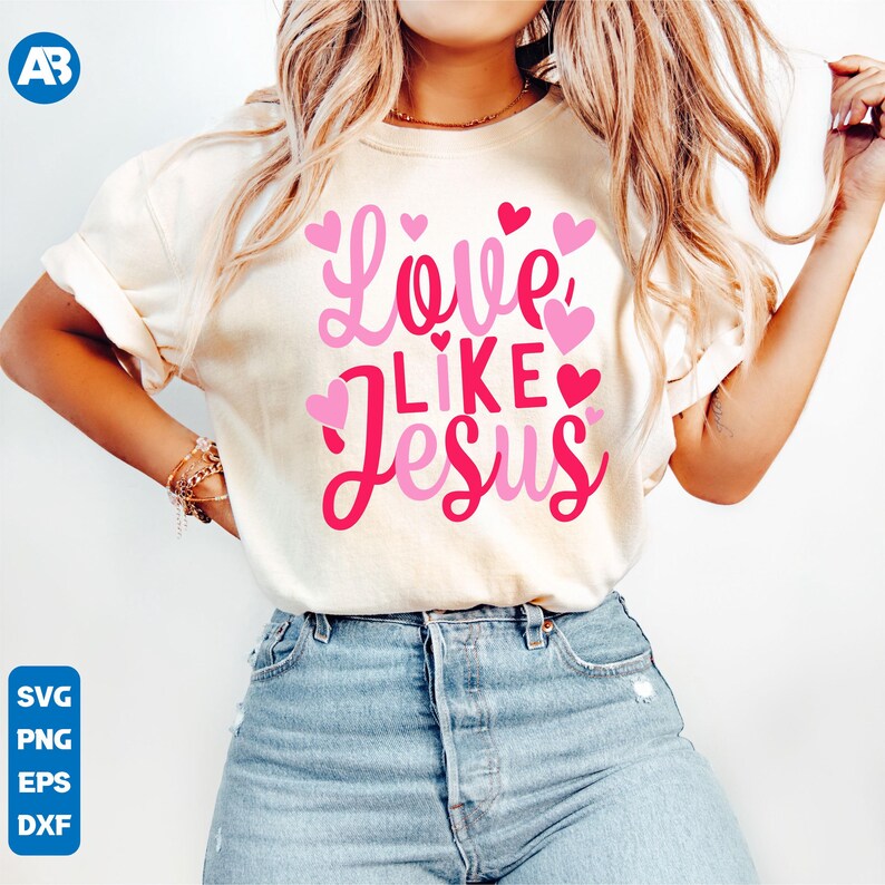 May include: A white t-shirt with the text "Love Like Jesus" in pink lettering and pink hearts.