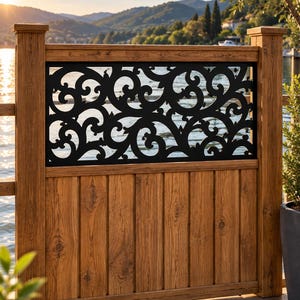 May include: A wooden fence panel featuring a vertical plank base and a black metal insert with an intricate scrollwork pattern. The structure is framed by two sturdy wooden posts, combining natural wood grain textures with decorative metalwork.