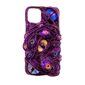May include: Purple phone case with a design of multiple eyes with different colored irises and pupils.