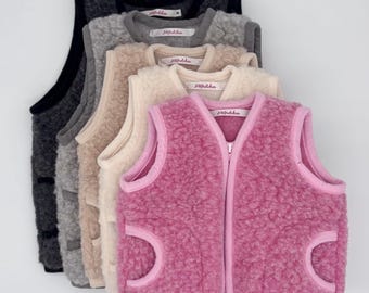Chaleco de lana 100 % merino de Europa. Pelo de lana de cordero con aspecto de peluche.