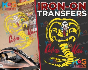 May include: Iron-on transfers with a yellow cobra design and the words "Cobra Kai". The image includes instructions and a close-up of an iron. The text "IRON-ON TRANSFERS" is displayed in white on a black background.