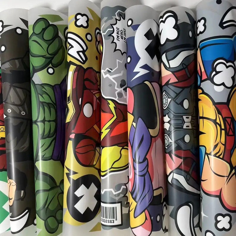 May include: A set of six colorful vinyl stickers featuring various cartoon characters. The stickers include a green Hulk, a red Iron Man, a yellow and red Flash, a purple and pink character, a black and red character, and a blue and yellow character. The stickers have a glossy finish and are perfect for adding a pop of color to laptops, water bottles, or other surfaces.