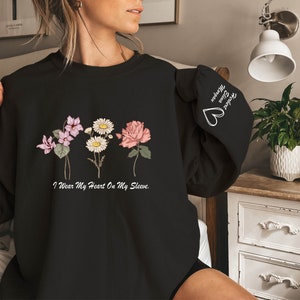 I Wear My Heart On My Sleeve Sweatshirt, Custom Mama Sweatshirt With Kid Name On Sleeve, Custom Mama Hoodies, Gift for Mother's Day Sweater