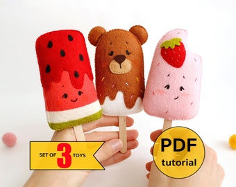 May include: Set of three felt ice cream toys. The ice creams are watermelon, chocolate bear, and strawberry. The toys are handmade and come with a PDF tutorial. "Set of 3 Toys" and "PDF tutorial" are written on the image.