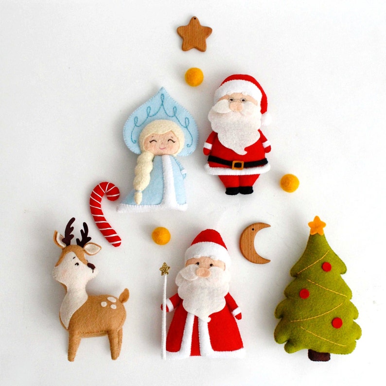 Felt Christmas toys - Snow maiden, Santa Claus, reindeer Rudolph, Grandfather Frost and green Christmas tree with lights garland