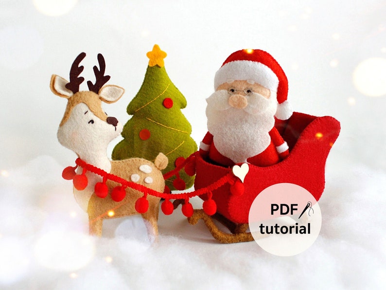 May include: A felt Christmas craft kit featuring Santa Claus in a red sleigh pulled by a reindeer. The kit includes a PDF tutorial for making the felt ornaments.