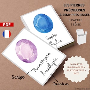 Puede incluir: Un conjunto de tarjetas blancas con ilustraciones de acuarela de piedras preciosas, incluyendo un zafiro azul y una amatista púrpura. Las tarjetas tienen texto en francés, incluyendo "LES PIERRES PRÉCIEUSES & SEMI-PRÉCIEUSES". También se ve una pequeña caja blanca.