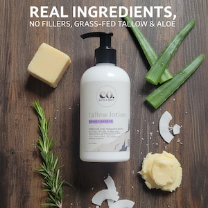 May include: A white bottle of "tallow lotion" with a black pump, surrounded by aloe vera leaves, rosemary, and coconut flakes. The text "REAL INGREDIENTS, NO FILLERS, GRASS-FED TALLOW & ALOE" is at the top.