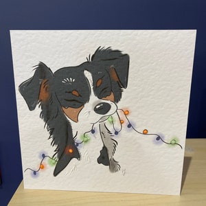 Tricoloured Christmas collie, blank greetings card