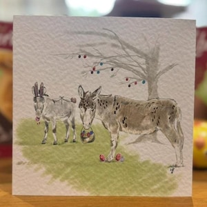 Caça aos ovos de Páscoa de burro, cartão de felicitações em branco