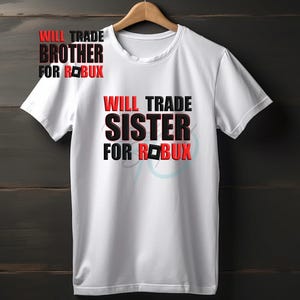 May include: White t-shirt with the text "WILL TRADE SISTER FOR ROBUX" in black and red. The shirt also has the text "WILL TRADE BROTHER FOR ROBUX" in black and red. The shirt is hanging on a wooden hanger.