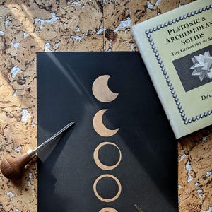 Solar Eclipse Linocut Print – Handprinted Gold Celestial Wall Art (Unframed)