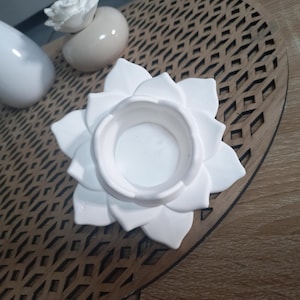 White lotus candle holder