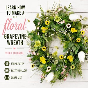 May include: A floral grapevine wreath with yellow sunflowers, white tulips, and green foliage. The wreath is displayed on a white wooden background. Text on the image reads "Learn How to Make a Floral Grapevine Wreath" and "Video Tutorial".