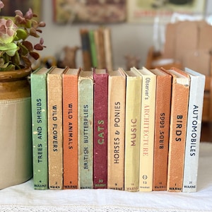 May include: A collection of eleven vintage Observer's books with colourful spines, including titles like Trees and Shrubs, Wild Flowers, Wild Animals, British Butterflies, Cats, Horses & Ponies, Music, Architecture, Birds' Eggs, Birds, and Automobiles.
