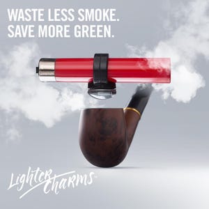 May include: A red lighter with a black clamp attached to a pipe. The lighter is hovering above the pipe, with smoke coming from the pipe. The text "WASTE LESS SMOKE. SAVE MORE GREEN." is at the top of the image. The text "Lighter Charms" is at the bottom of the image.