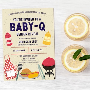 May include: A tan baby shower invitation with a blue and white text that reads "You're invited to a Baby-Q Gender Reveal". The invitation features a red and white checkered apron, a spatula, a grill, a hot dog, a hamburger, a bottle of ketchup, and a bottle of mustard. The text also includes the date, time, and address of the event.