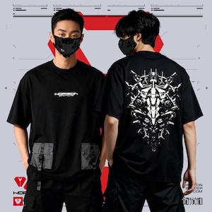 May include: Black t-shirts with a futuristic design. The front of the shirt has the word "HORIZON" in white, and the back features a detailed white graphic. The shirts have two front pockets and are worn with black cargo pants.