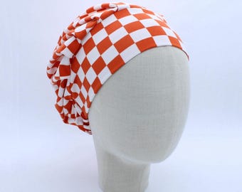 Red/Orange Checkered Pattern on Double Brushed Poly in a Bouffant Style Scrub Cap
