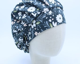 White and Soft Blue Dainty Flowers on Dark Background in a Bouffant-Style Scrub Cap