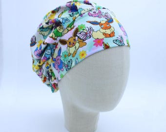 Colorful Creatures on Double Brushed Poly in a Bouffant Style Scrub Cap