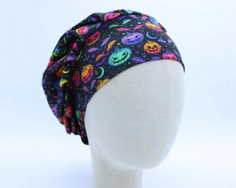 Small Scale Neon Pumpkins on Double Brushed Poly in a Bouffant Style Scrub Cap
