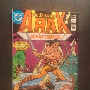 May include: A comic book cover featuring a muscular man with a sword, a green monster, and the text "Arak Son of Thunder".