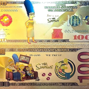 May include: A gold-coloured paper bill with the words "The Simpsons" and "GOLD 99999999" printed on it. The bill features images of characters from the animated television show The Simpsons, including Homer, Marge, Bart, Lisa, and Maggie.