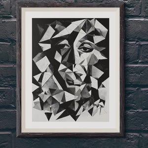 May include: Framed black and white geometric art print of a face. The artwork is in a dark wooden frame and hangs on a dark brick wall. Decorative cushions are below the artwork.