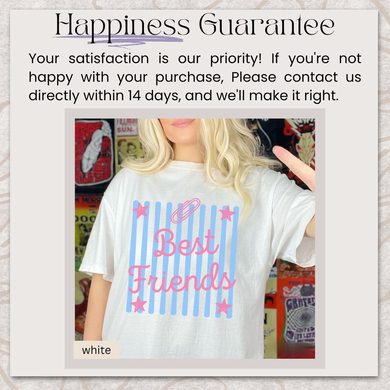 May include: A white t-shirt featuring a graphic design with vertical light blue stripes, pink stars at the corners, and the text "Best Friends" in pink script. The top of the graphic includes a pink paperclip icon. The shirt is white.