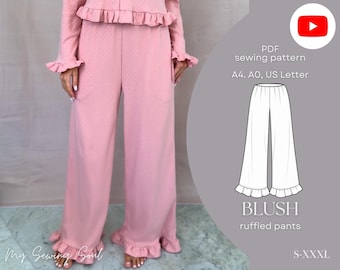 May include: A pair of dusty pink wide-leg trousers featuring a textured fabric, a ruffled hem, and a matching ruffled top. The image includes text: PDF sewing pattern, A4, A0, US Letter, BLUSH ruffled pants, and S-XXXL.