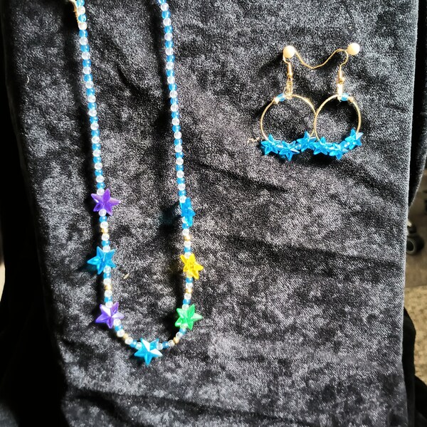 girls multicolored necklace and earrings